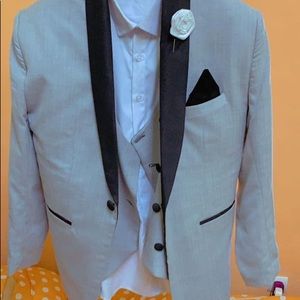 A complete black and gray suit